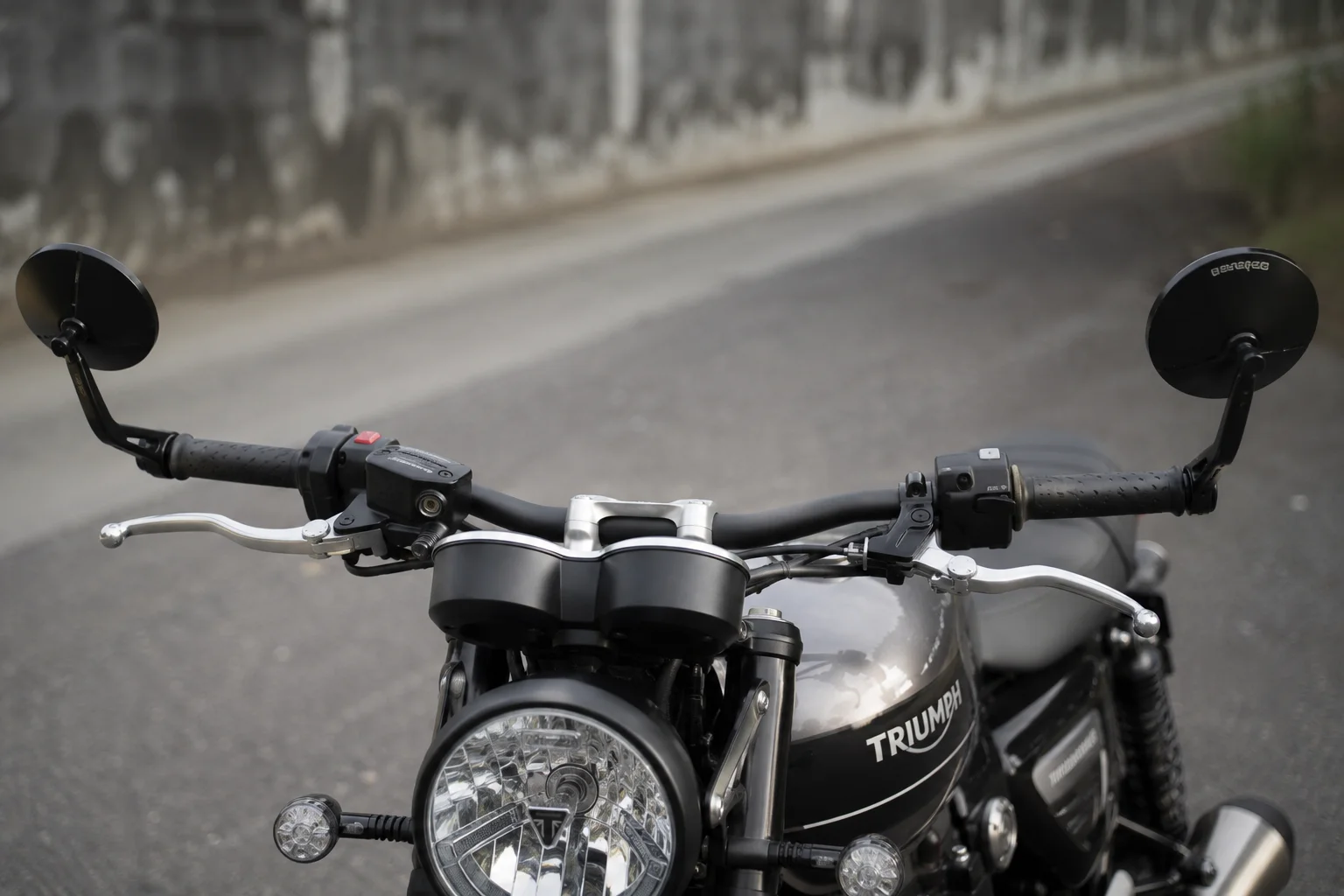 Triumph Speed Twin 1200 with upgraded bar-end mirrors.