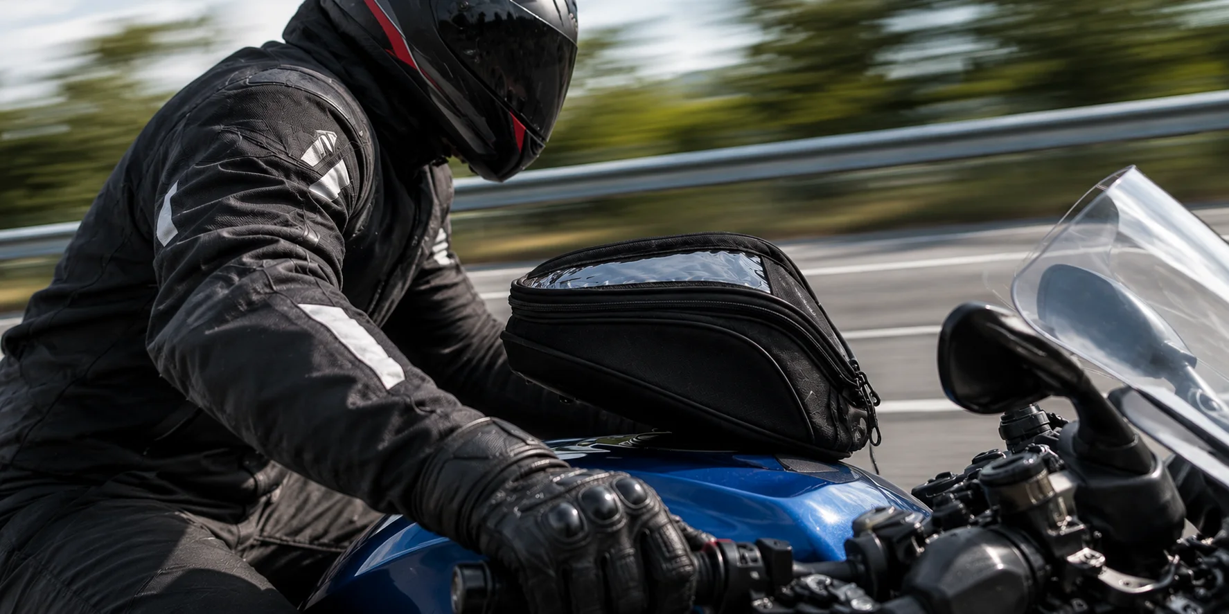 Motorcycle tank bag lifting during a highway ride